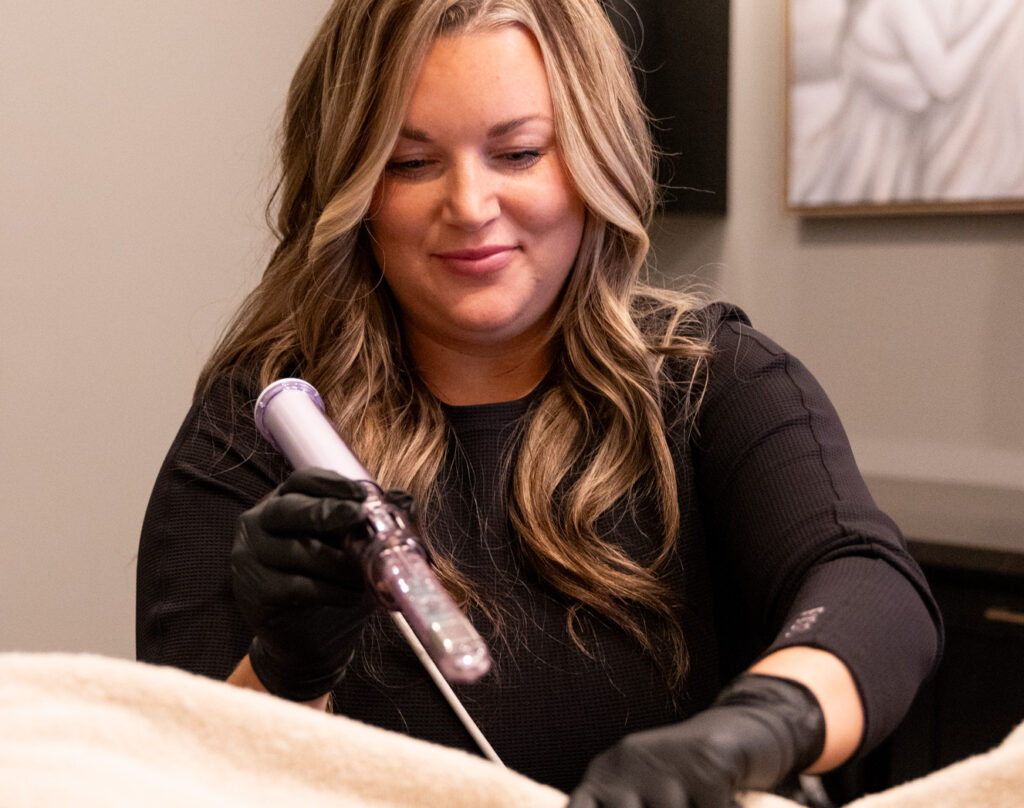 Close up of a medical provider at The Sonography Studio administering Vaginal Tightening in Panama City.